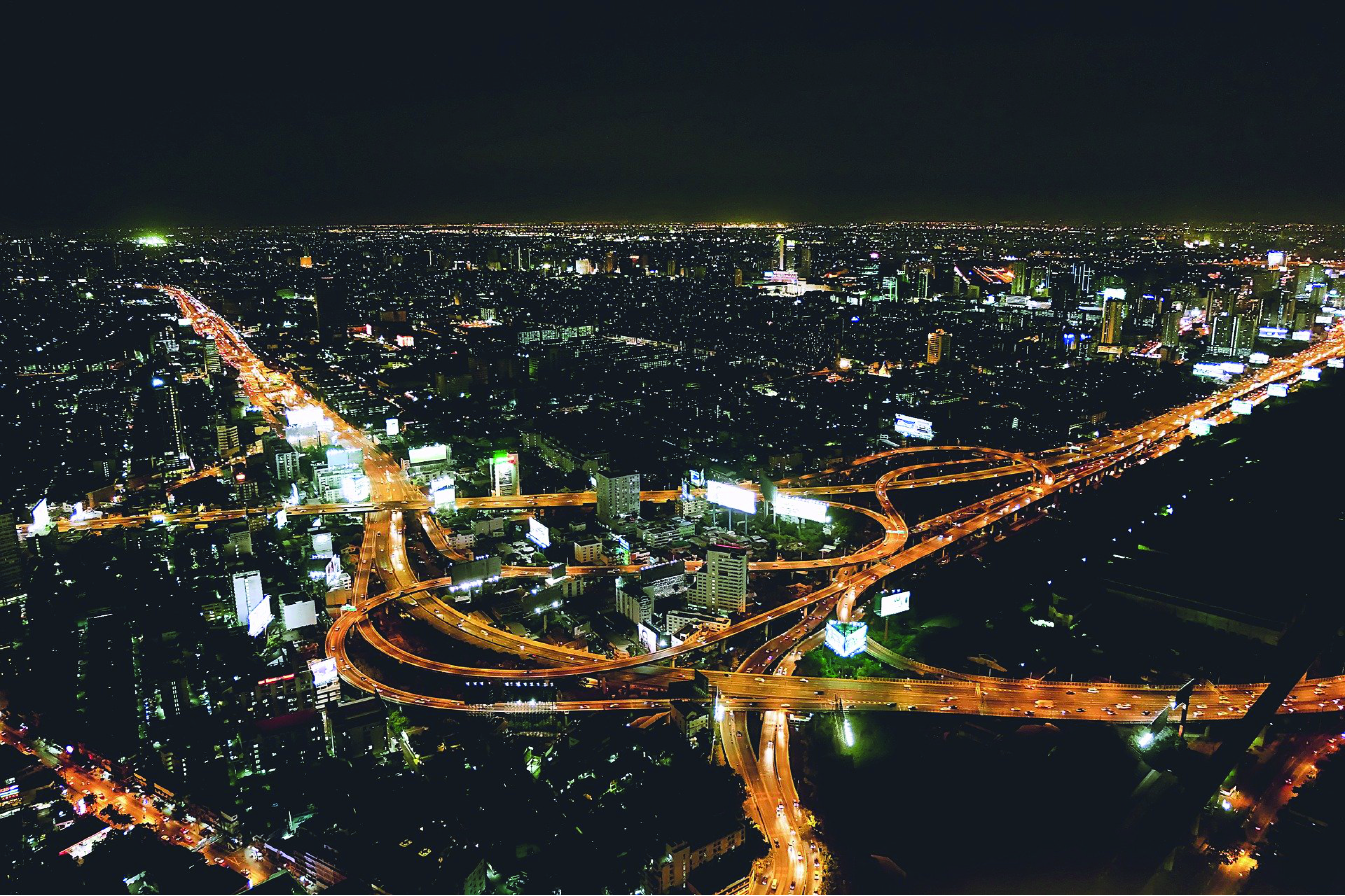 Illuminated city with crossroads